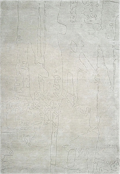 Hand tufted abstract textured gray wool rug with a subtle pattern