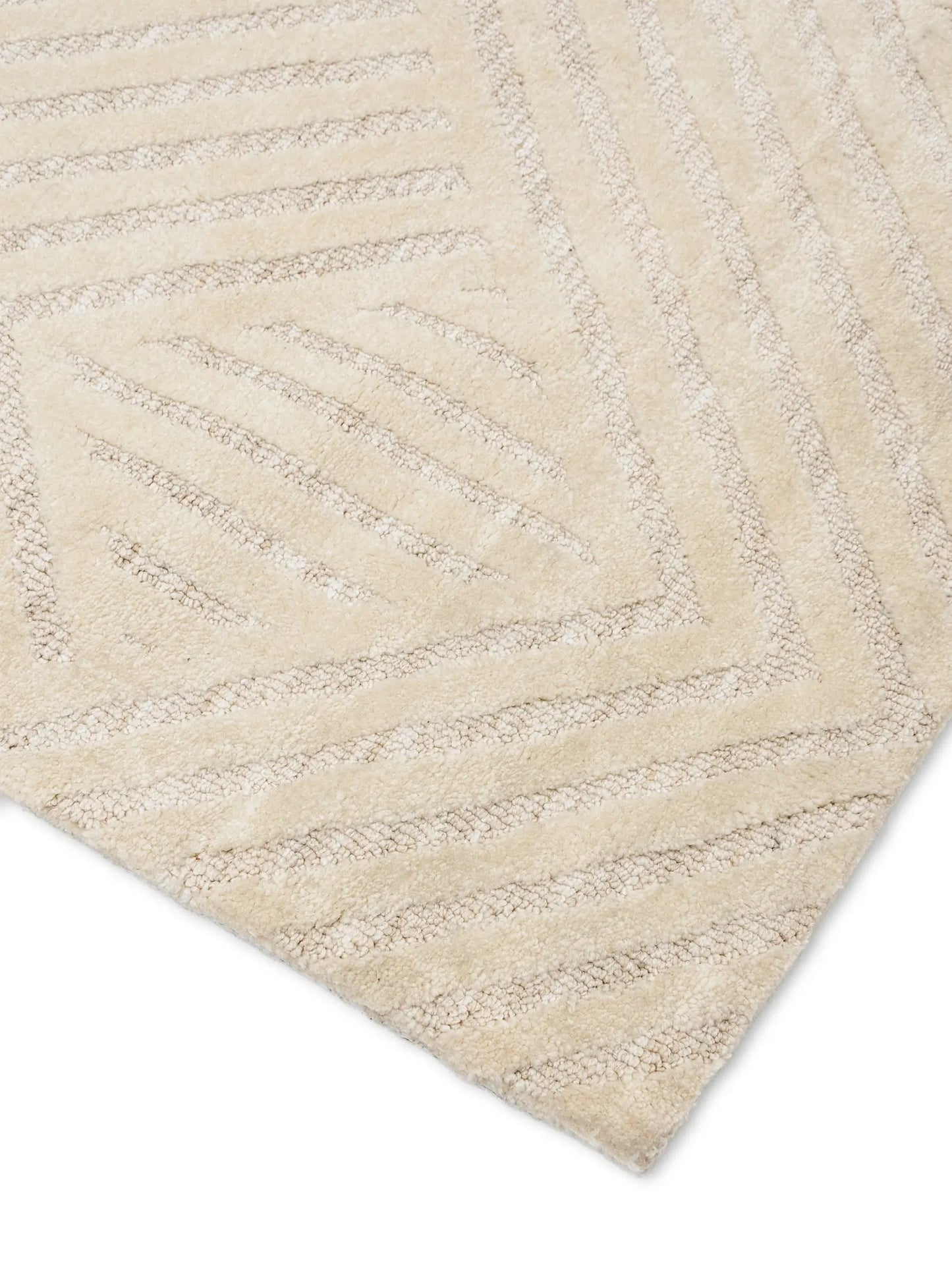 Beige textured rug with geomatric pattern