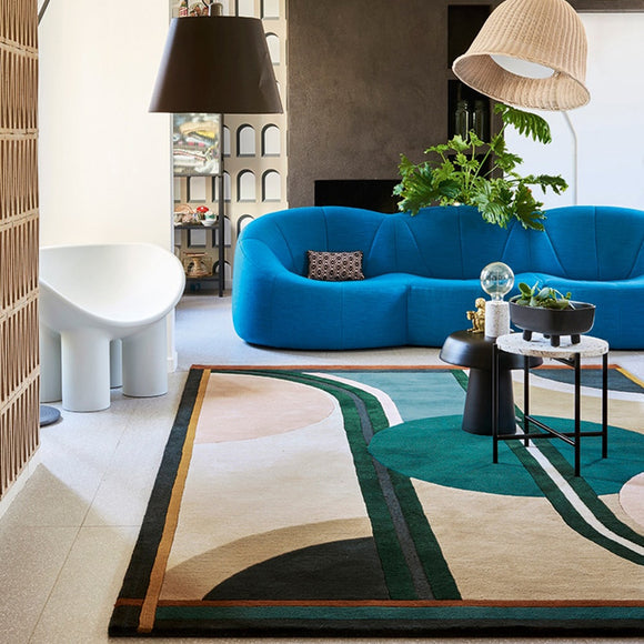 bold and colorful modern hand tufted rug in living room