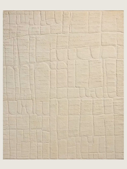 beige textured hand knotted wool rug