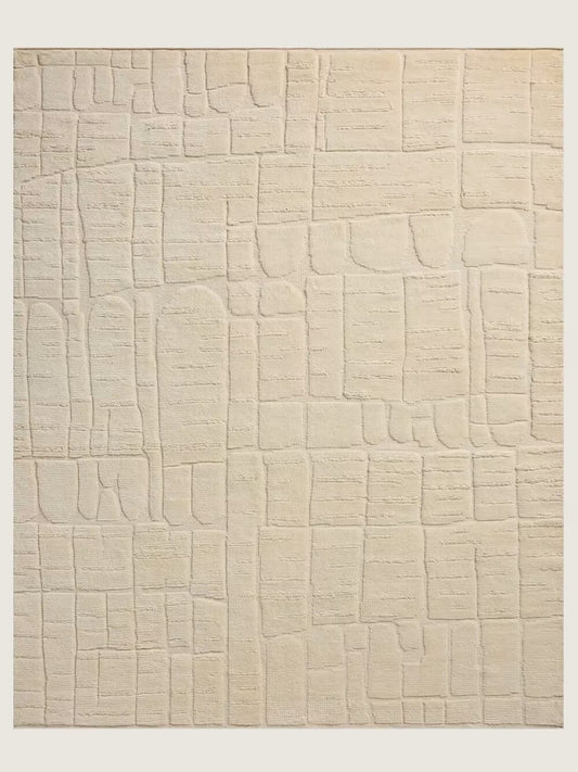 beige textured hand knotted wool rug