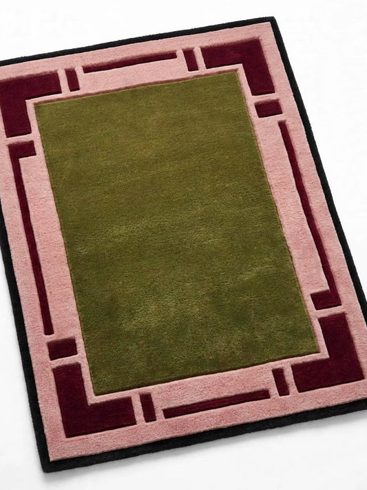 hand tufted indian wool area rug with a central olive green field