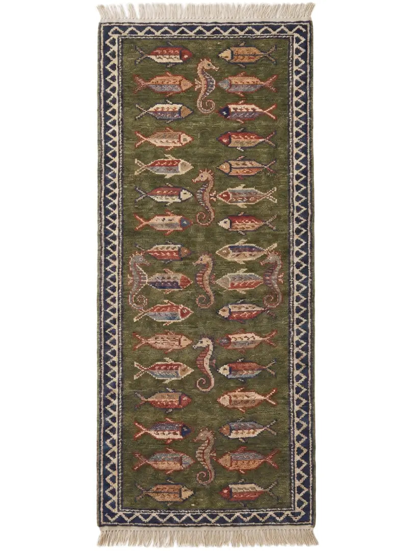 a hand knotted wool runner rug with pattern of stylized fish