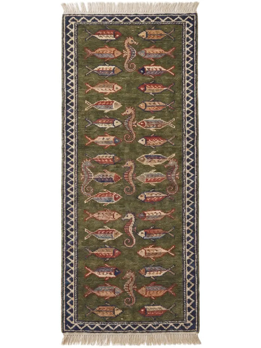 a hand knotted wool runner rug with pattern of stylized fish