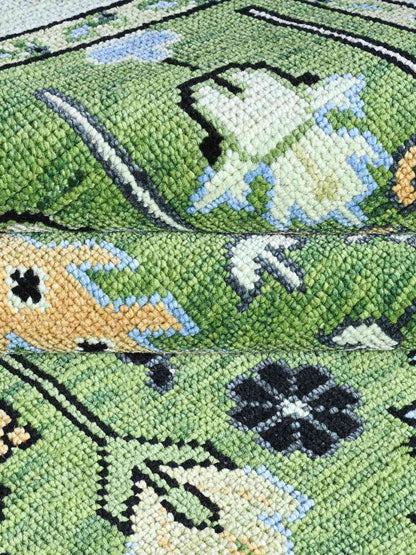garden green hand knotted rug closeup