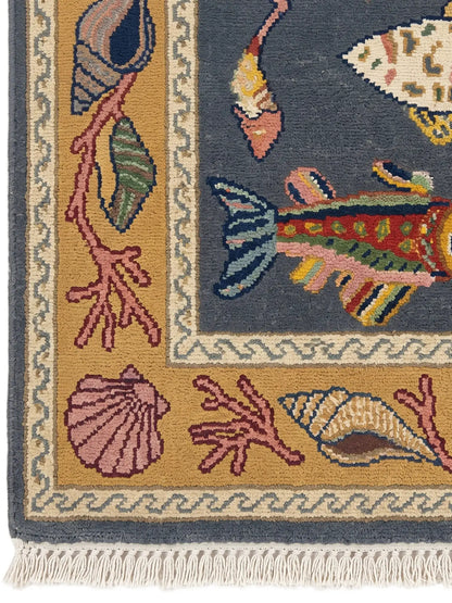 hand knotted wool area rug with fringes