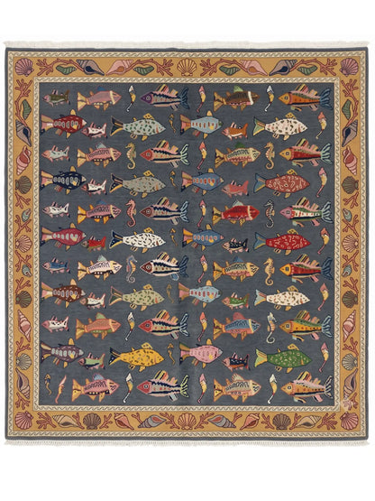 hand knotted area rug with colorful fish patterns