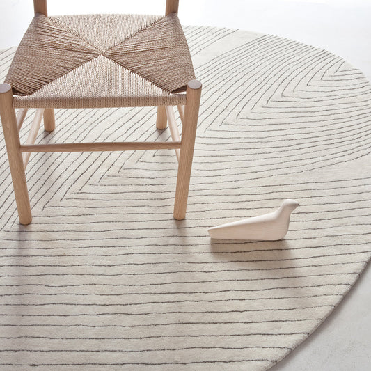 chair on heppa white shaped wool bedside rug