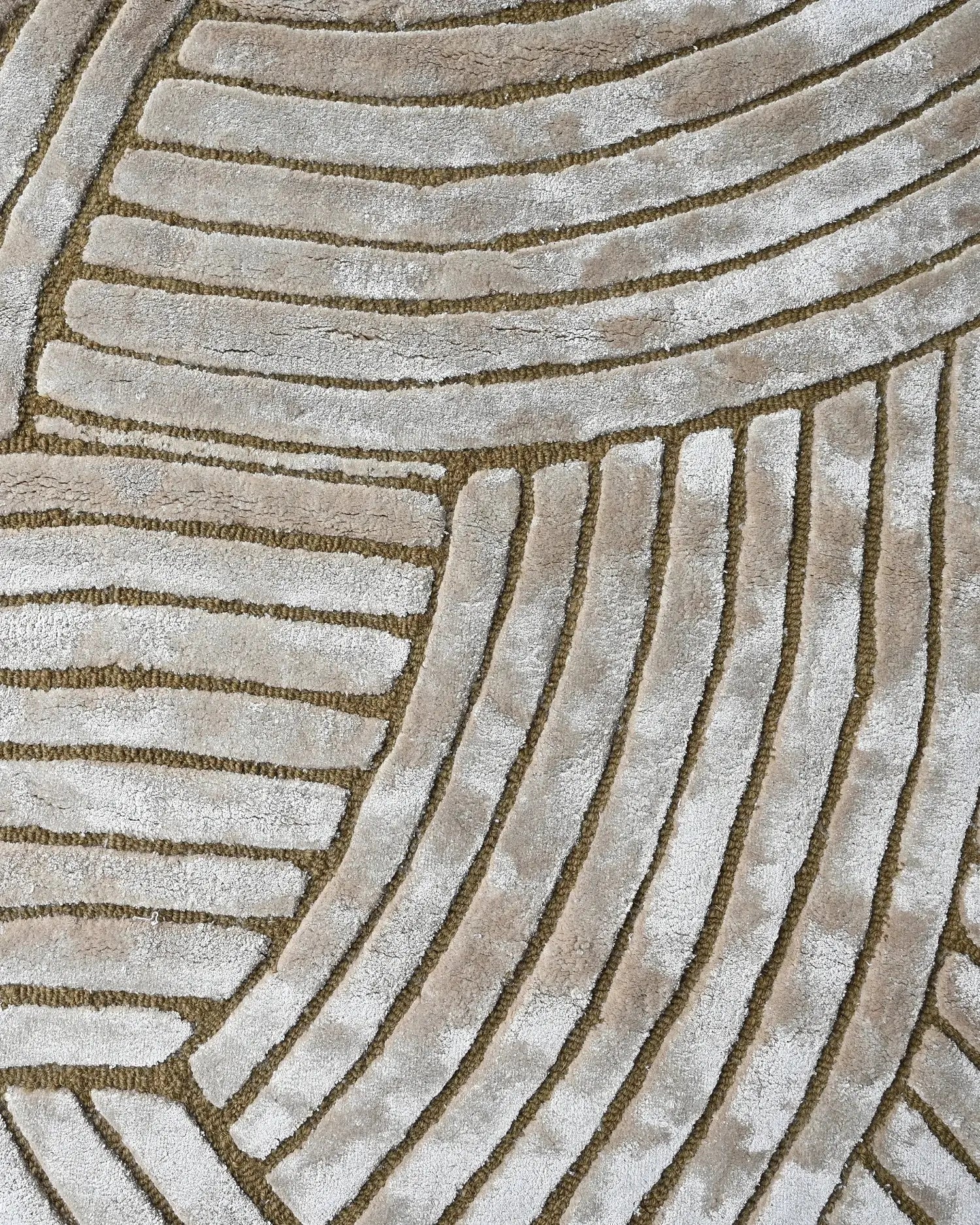 beige hand tufted silk rug