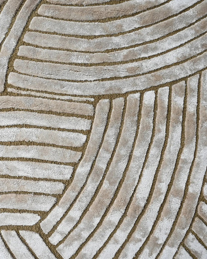 beige hand tufted silk rug