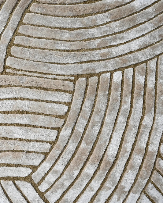 beige hand tufted silk rug