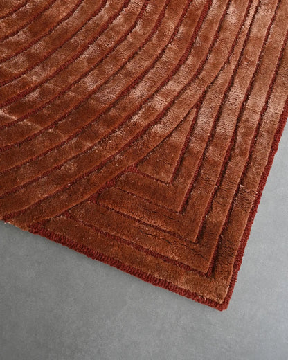 Brown textured hand tufted rug