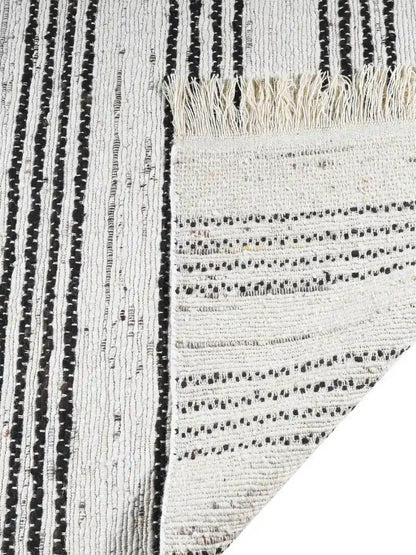 black and white woven jute rug