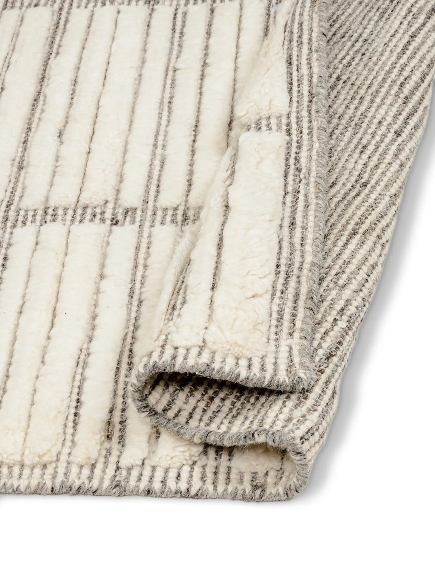 off white knotted wool area rug