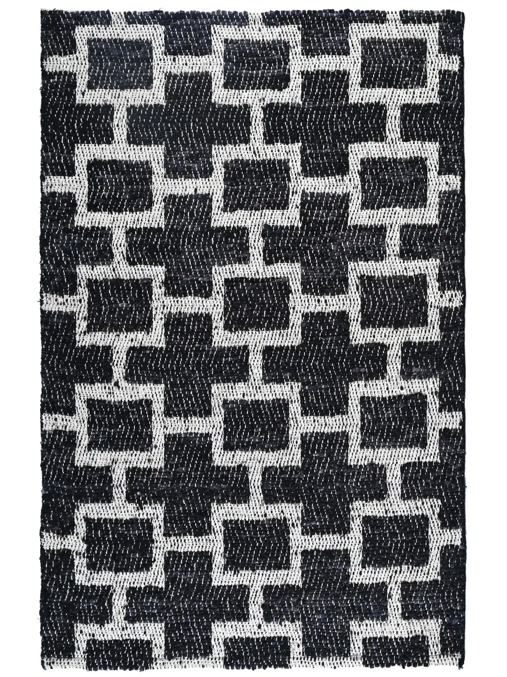 A hand woven area rug with a black and white geometric pattern
