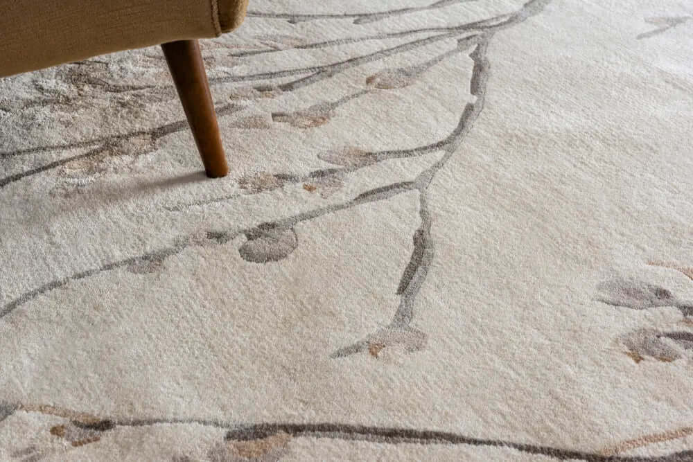 close up of a floral hand tufted wool rug