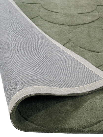 green hand tufted wool rug