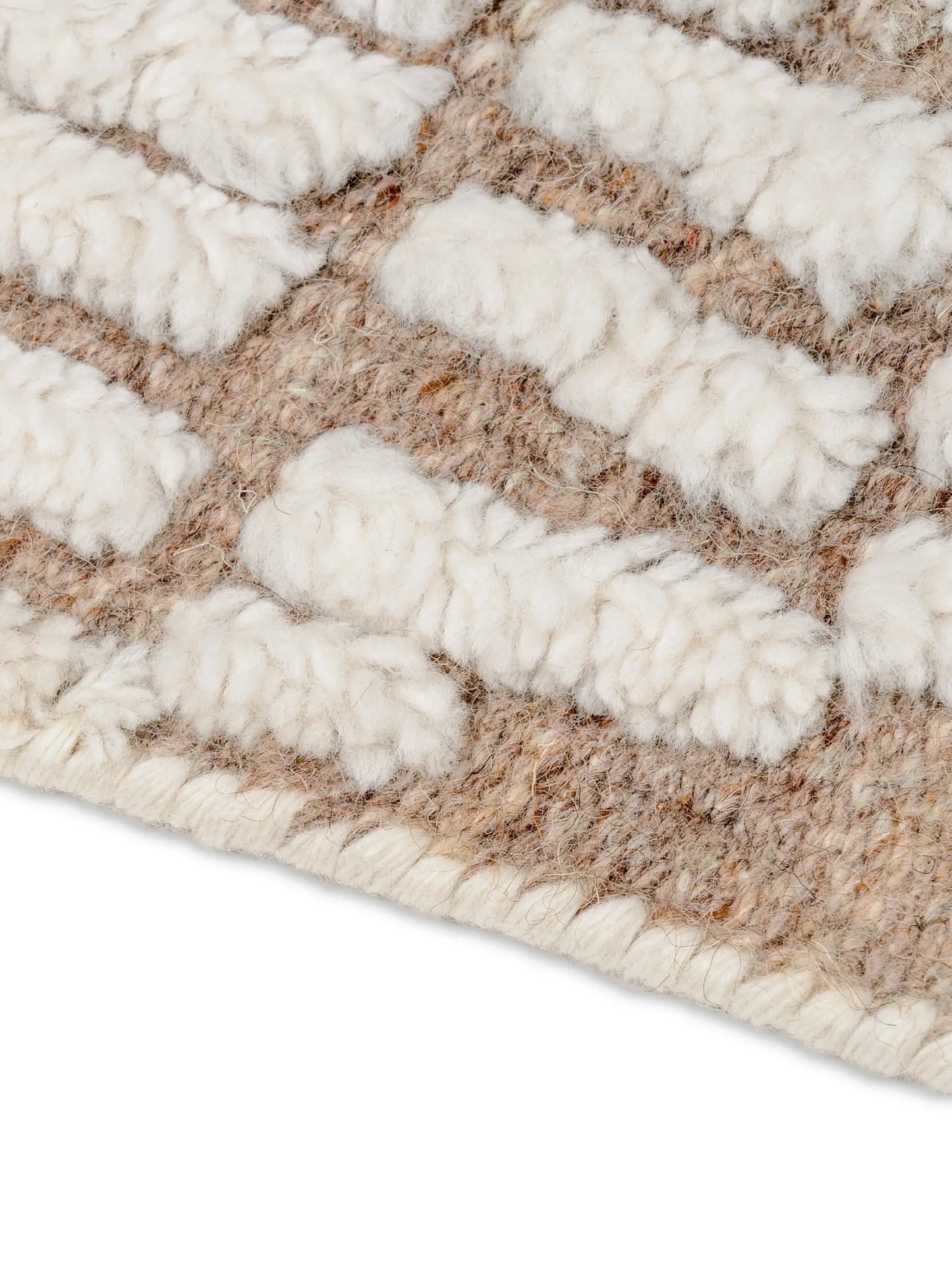 close up of hand knotted wool carpet