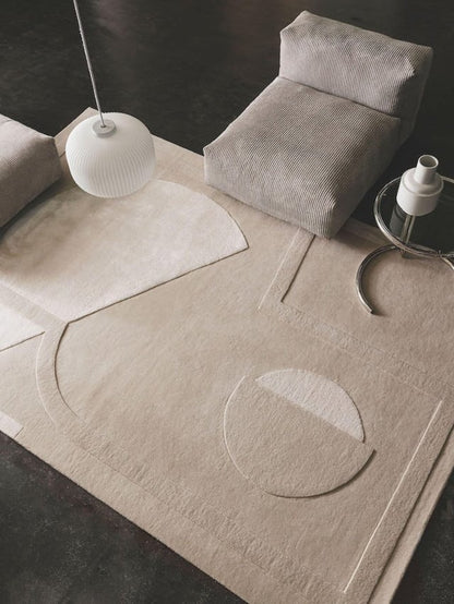 living room with hand-tufted wool and silk rug