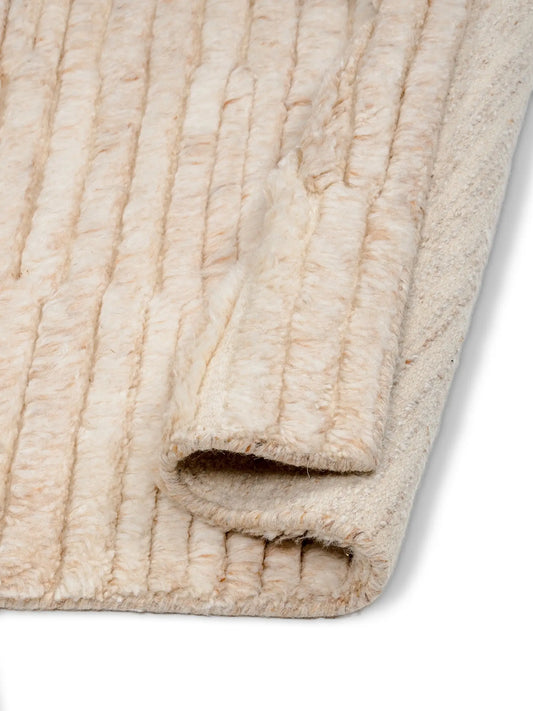knotted wool rug's corner close up