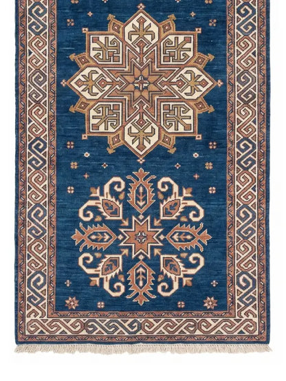 A traditional oriental-style runner rug with a deep blue field
