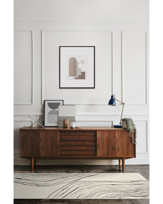 modern hand tufted wool rug in living area