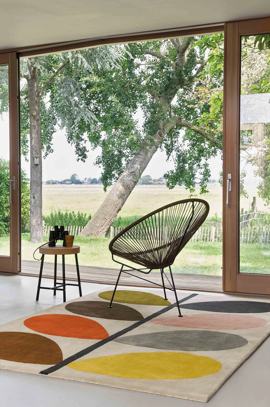 meena multicolor rectangle wool rug in living area