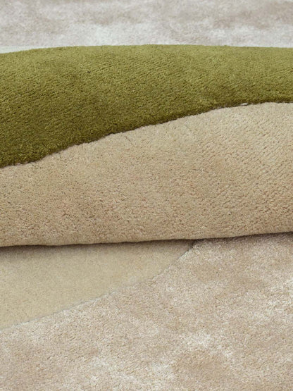 Close-up of a plush, textured hand tufted area rug