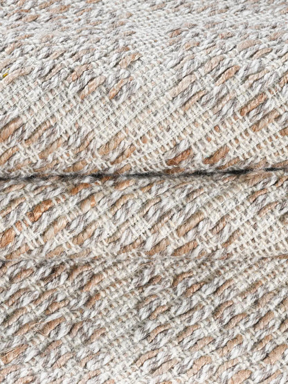close up of hand woven jute rug