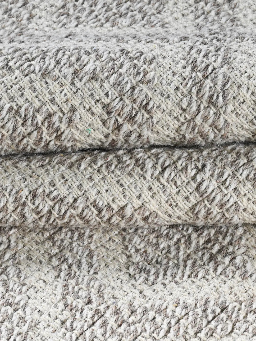close up of hand woven jute rug