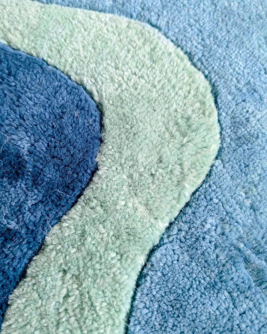 novii hand tufted wool rug closeup
