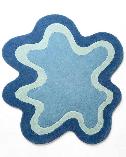 organic shaped hand tufted wool area rug