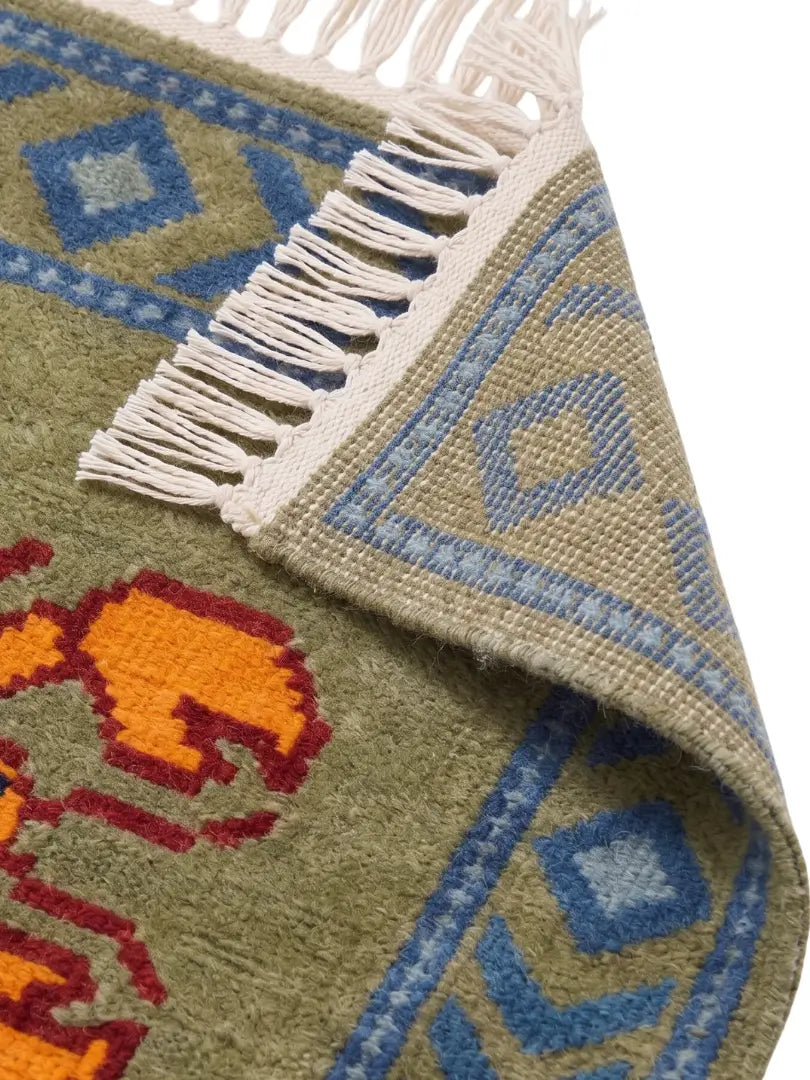 green knotted runner rug back