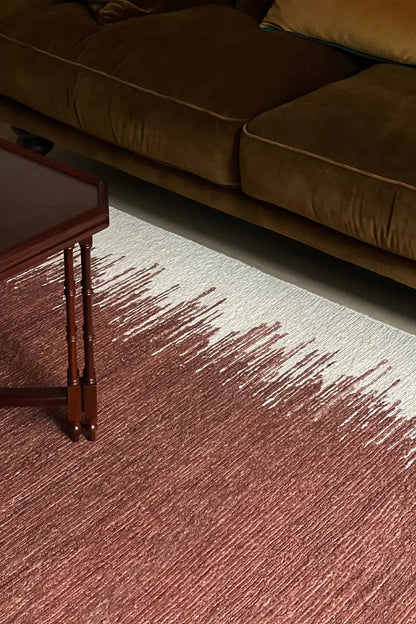 red jute area rug in living area