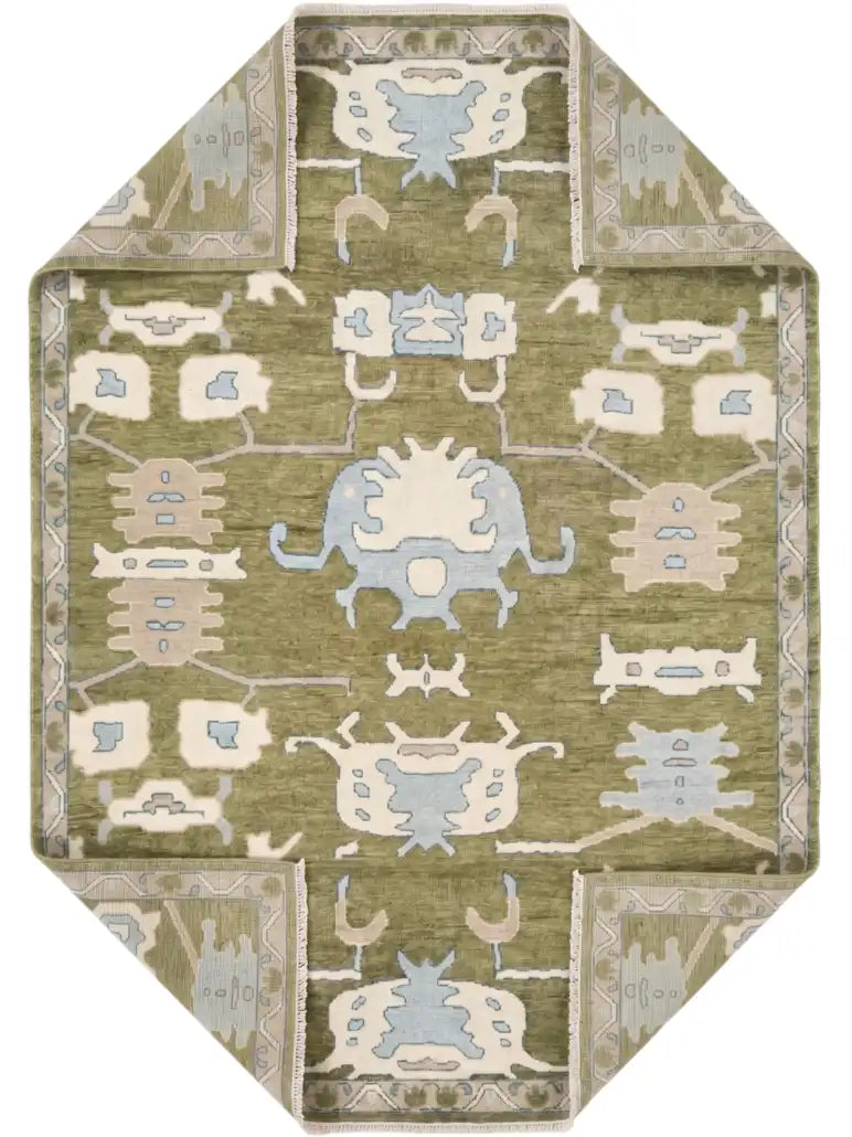 wool area rug featuring a traditional tribal-inspired pattern