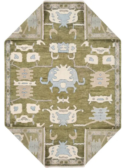 wool area rug featuring a traditional tribal-inspired pattern