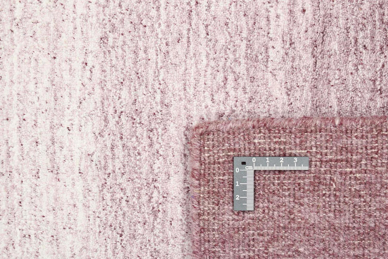 close up of gradient gray hand woven wool area rug