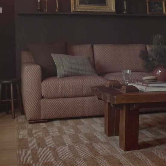 brown hand tufted wool rug in living areas