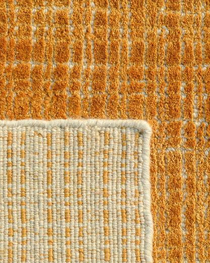 loom and hand tufted wool rug