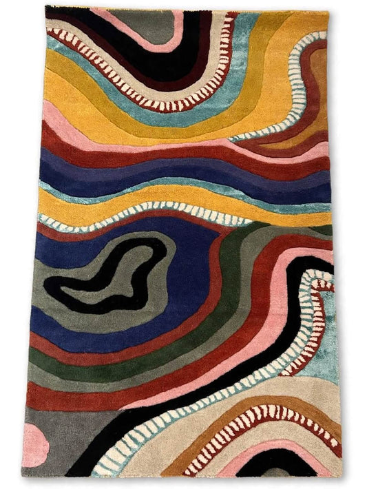 ringo hand tufted area rug featuring a vibrant, multicolored abstract wavy pattern