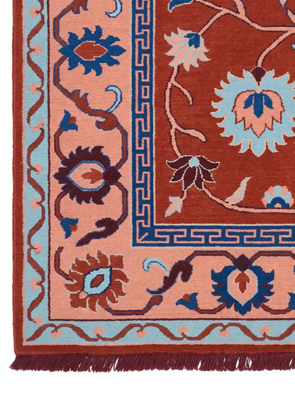 Close-up of an ornate hand knotted patterned rug
