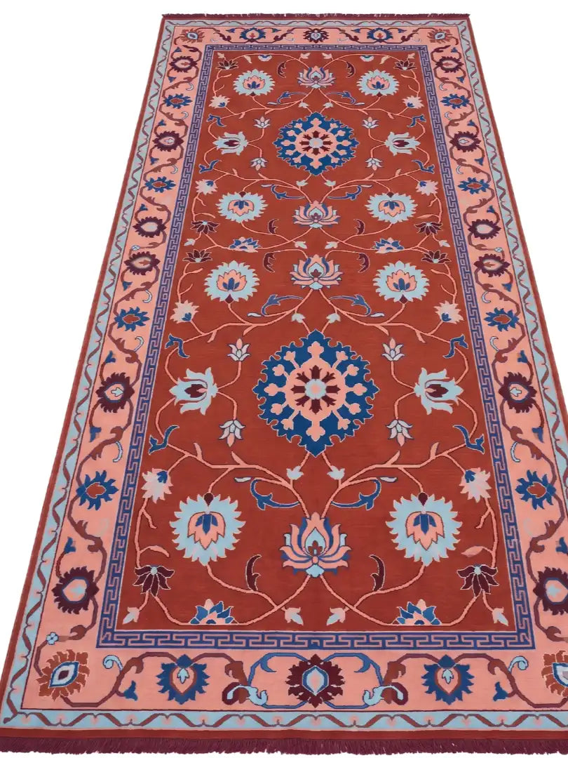 a traditional hand knotted runner rug in rust shade