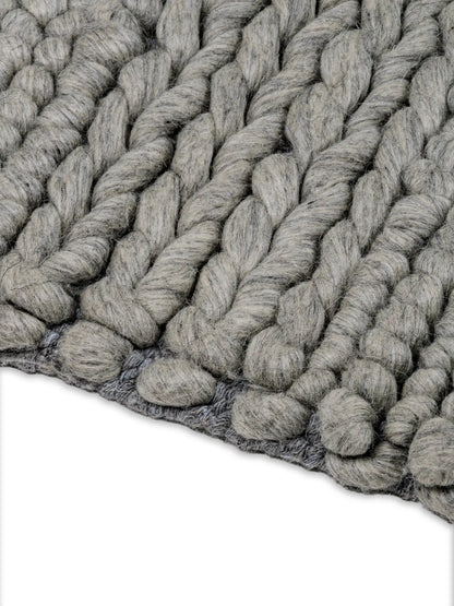 Close-up of gray textured wool area rug