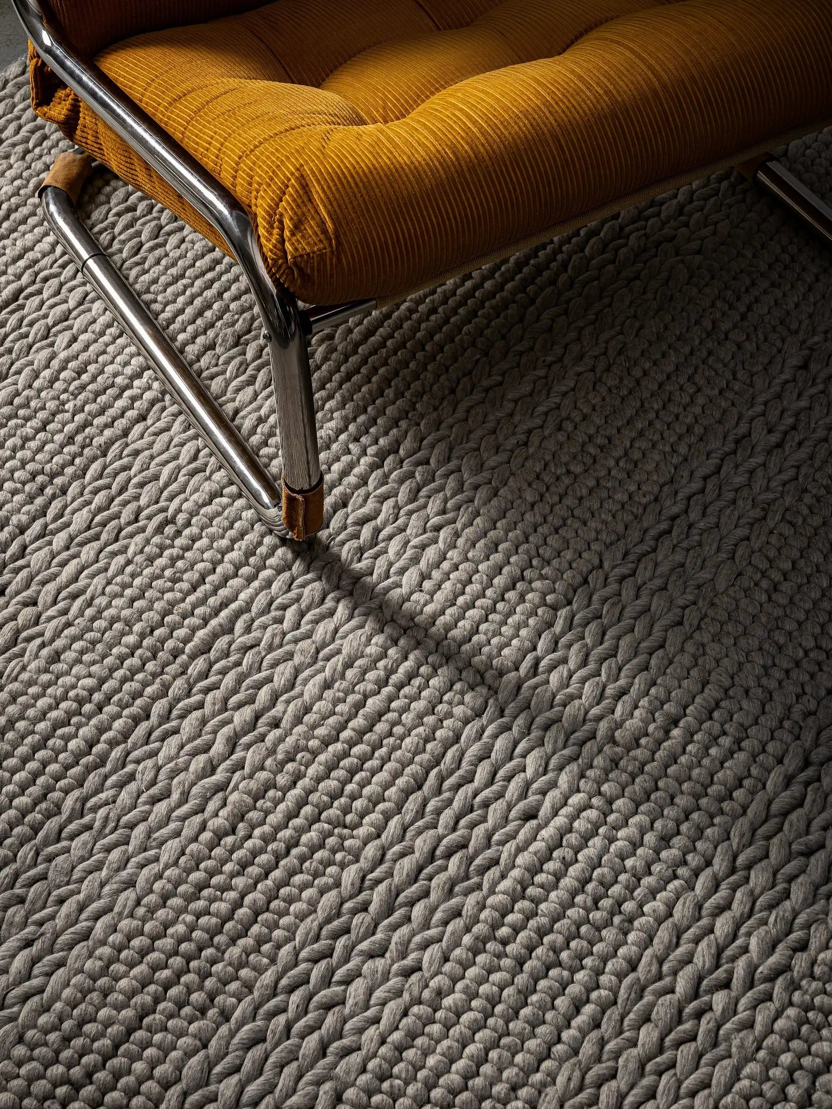 hand woven wool rug with chair