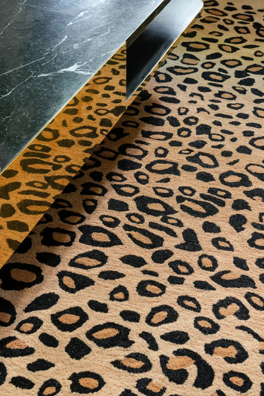 Leopard print pattern hand tufted wool area rug