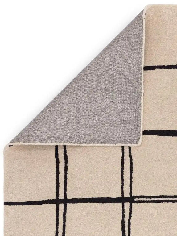 beige tufted wool rug back