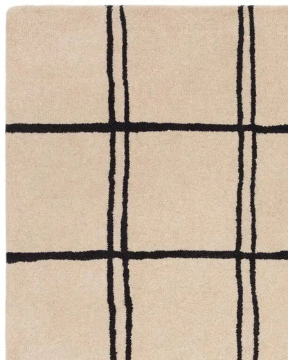 beige carpet with black grid pattern