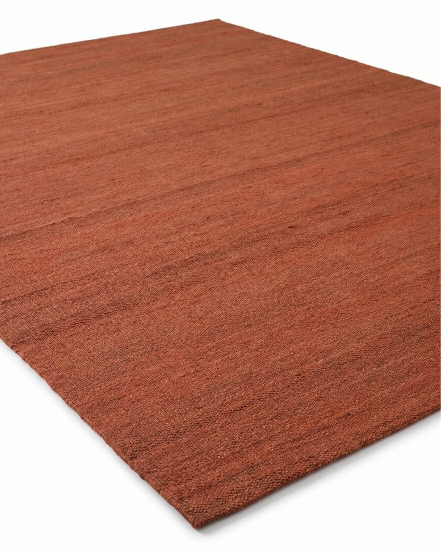 hand woven natural jute rug in rust red