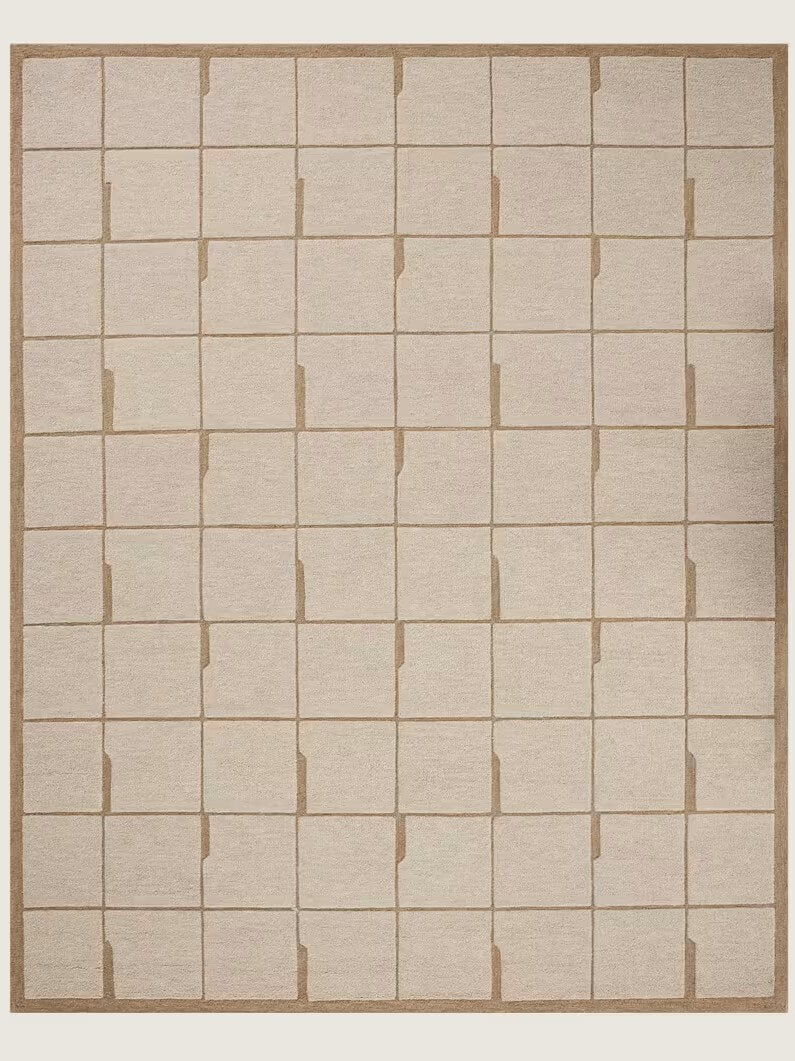 Beige hand tufted wool area rug with a grid pattern